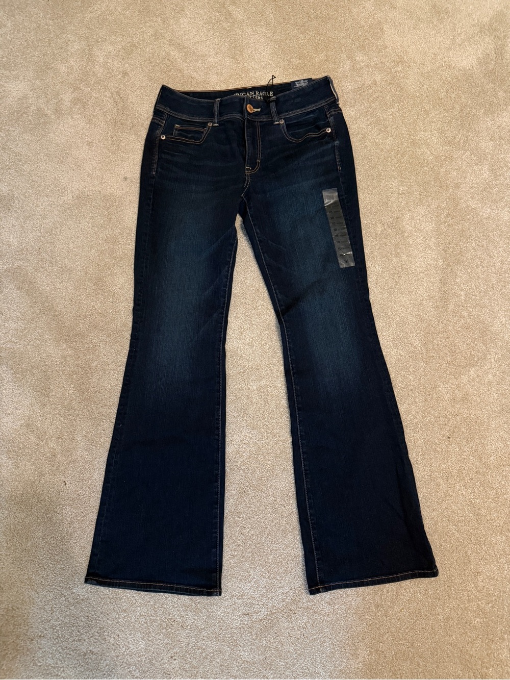 NWT American Eagle Outfitters Dark Blue Book Kick Super Stretch Jeans | Size 10